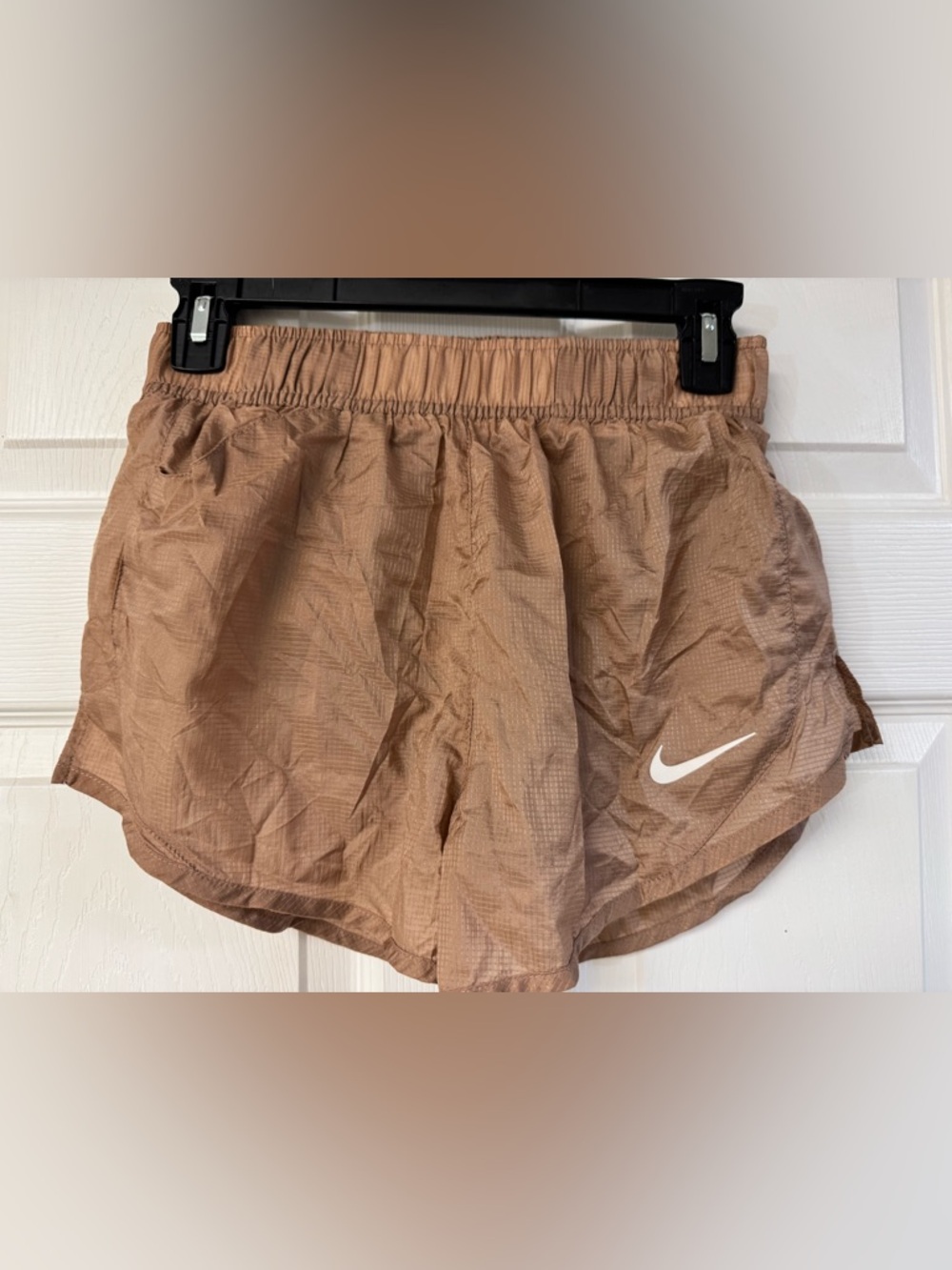 Nike champagne Athletic Shorts with White Swoosh